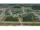 Aerial view showcasing neighborhood amenities including a pool and walking paths at 11713 Chevelon Ln, Parrish, FL 34219