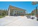 Community outdoor gathering space with a large pavilion, tables, and seating at 11713 Chevelon Ln, Parrish, FL 34219