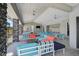 Stylish clubhouse area with modern furnishings, ceiling fans and an entertainment area at 11713 Chevelon Ln, Parrish, FL 34219