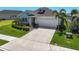 Well maintained single Gathering home with front yard landscaping and 2-car garage at 11713 Chevelon Ln, Parrish, FL 34219