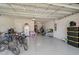 Spacious garage with epoxy floors offering plenty of storage space at 11713 Chevelon Ln, Parrish, FL 34219