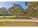 Community park featuring a basketball court, playground, picnic area, and walking paths at 12014 Beeflower Dr, Lakewood Ranch, FL 34202