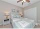 Charming bedroom boasts a comfortable bed, neutral walls, and a large closet for ample storage space at 12720 Sorrento Way # 103, Bradenton, FL 34211