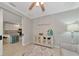 Stylish living room with access to the kitchen and views of modern decorations at 12720 Sorrento Way # 103, Bradenton, FL 34211