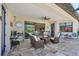 Spacious outdoor patio with comfortable seating and view of the pool at 13786 Vancanza Dr, Venice, FL 34293