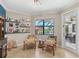 Bright sitting area with a view of the pool and access to the outdoor space at 13786 Vancanza Dr, Venice, FL 34293