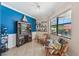 Cozy sitting area with a view of the pool and decorated with nautical accents at 13786 Vancanza Dr, Venice, FL 34293