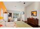 Bright main bedroom featuring hardwood floors, high ceilings, and a view of the pool at 1447 Gleneagles Dr, Venice, FL 34292