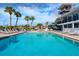 Inviting community pool with lounge chairs and manicured landscaping, perfect for relaxation at 172 Sea Anchor Dr, Osprey, FL 34229