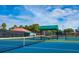Well-maintained tennis court featuring new netting and lighting for a pleasant recreational experience at 172 Sea Anchor Dr, Osprey, FL 34229