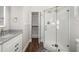 This bathroom features a glass door shower and modern vanity at 19006 69Th E Ave, Bradenton, FL 34211