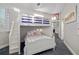 bedroom with bunk bed and sunny windows at 19006 69Th E Ave, Bradenton, FL 34211