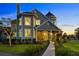 Stunning two-story home boasts beautiful architecture, mature landscaping, and a charming entrance at 19006 69Th E Ave, Bradenton, FL 34211