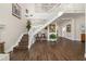 Grand foyer with a staircase and hardwood floors, creating an inviting entryway at 19006 69Th E Ave, Bradenton, FL 34211