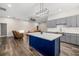 Stylish kitchen with a large island, modern appliances, and open layout at 19006 69Th E Ave, Bradenton, FL 34211