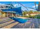 Beautiful screened-in pool with brick paver decking at 19006 69Th E Ave, Bradenton, FL 34211