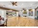 Elegant community center with a large mirror, fireplace, and a cozy library for relaxation and socializing at 2353 Rosewood Ln, North Port, FL 34289