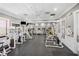 Well-equipped fitness center with modern weight machines, treadmills, and ample space for exercise at 2353 Rosewood Ln, North Port, FL 34289