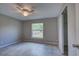 Comfortable bedroom features tile floors, a ceiling fan, and a closet with sliding doors at 25 Sabot Ct, Placida, FL 33946