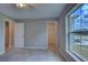 Bedroom featuring tile floors, a ceiling fan, and a closet at 25 Sabot Ct, Placida, FL 33946