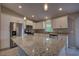 Modern kitchen with granite countertops, stainless steel appliances, and ample cabinet space at 25 Sabot Ct, Placida, FL 33946