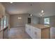 Open-concept kitchen featuring a large island with granite countertops and stainless steel appliances at 25 Sabot Ct, Placida, FL 33946