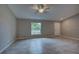 Bright living area featuring a large window offering natural light and stylish tile flooring at 25 Sabot Ct, Placida, FL 33946