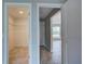 Walk-in closet featuring wire shelving, adjacent to a hallway and a doorway to another room at 25 Sabot Ct, Placida, FL 33946