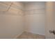 Spacious walk-in closet featuring wire shelving, offering ample storage in this home at 25 Sabot Ct, Placida, FL 33946