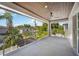 Large balcony with wood ceilings and a peaceful view of the surrounding area at 2596 Floyd St, Sarasota, FL 34239