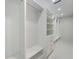 Spacious walk-in closet with custom shelving and ample storage space at 2596 Floyd St, Sarasota, FL 34239