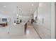 Contemporary kitchen featuring a center island, pendant lighting, and ample storage for a chef's delight at 2596 Floyd St, Sarasota, FL 34239