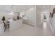 Modern kitchen with a waterfall island, custom cabinets, and sleek appliances for culinary enthusiasts at 2596 Floyd St, Sarasota, FL 34239
