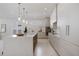 Elegant kitchen equipped with stainless steel appliances, quartz countertops, and custom cabinetry at 2596 Floyd St, Sarasota, FL 34239