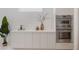 This kitchen shows modern cabinetry, stainless appliances, and sleek countertops at 2596 Floyd St, Sarasota, FL 34239