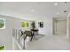 Open loft area with large windows, modern furniture and lots of natural light at 2596 Floyd St, Sarasota, FL 34239