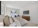 The bright main bedroom has a sliding glass door with access to the outside at 2596 Floyd St, Sarasota, FL 34239