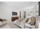 This main bedroom features recessed lighting, a dresser, and a TV at 2596 Floyd St, Sarasota, FL 34239