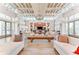 Spacious clubhouse interior with high ceilings, designer lighting, ample seating, and a kitchenette at 2806 Starwood Ct, Lakewood Ranch, FL 34211
