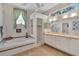 Bright bathroom featuring a soaking tub, walk-in shower, and double sinks at 2816 88Th E Ave, Parrish, FL 34219