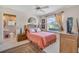 Comfortable bedroom featuring a dresser and window at 2816 88Th E Ave, Parrish, FL 34219