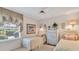 Cozy bedroom with two beds and a window at 2816 88Th E Ave, Parrish, FL 34219