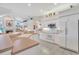 Spacious kitchen featuring white appliances and cabinetry, with an open layout at 2816 88Th E Ave, Parrish, FL 34219