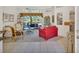 Bright living room with tile floors, comfortable seating, and large windows offering scenic views of the outdoors at 2816 88Th E Ave, Parrish, FL 34219