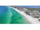 Sweeping aerial view showcasing the beautiful shoreline and turquoise Gulf along a residential area at 2918 Avenue E, Holmes Beach, FL 34217