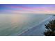 Beachfront view of ocean horizon at dusk at 2918 Avenue E, Holmes Beach, FL 34217