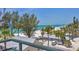 Beautiful view of the beach and Gulf from the home featuring white sand and clear blue water at 2918 Avenue E, Holmes Beach, FL 34217