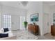 Spacious entryway featuring tile flooring, decor, and bright light at 2918 Avenue E, Holmes Beach, FL 34217