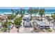 Modern three-story home boasting beach access at 2918 Avenue E, Holmes Beach, FL 34217
