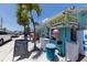 Charming AMI Beach Hut Convenience store with a giant ice cream cone and fun beachy decor at 2918 Avenue E, Holmes Beach, FL 34217